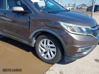 2015 Honda CR-V EX-L with VIN 2HKRM3H7XFH519437, listed as a IAAI auction lot 41656984 with 143,107 mi miles. Bid and sale history available at carsss.com. Image 6.