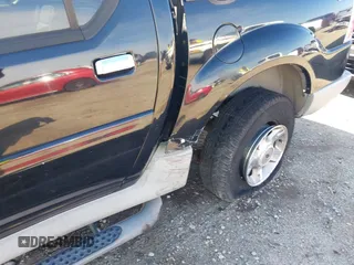 2003 Ford Explorer Sport Trac XLS z VIN 1FMZU77E23UB74361, wystawiony jako IAAI lot #42305659 z przebiegiem 193 291 mil mil oraz . Historia ofert i sprzedaży dostępna na DreamBid. Obrazek 6.