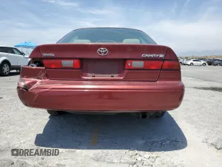 1999 Toyota Camry LE z VIN JT2BG22K6X0274398, wystawiony jako Copart lot #57263795 z przebiegiem 202 944 mil mil oraz Szkoda całkowita • Salvage title. Historia ofert i sprzedaży dostępna na DreamBid. Obrazek 6.