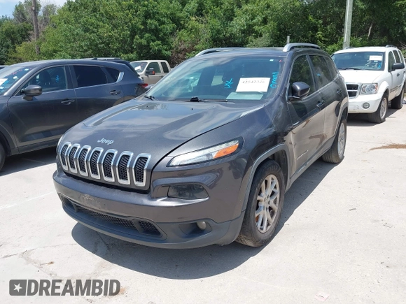 2016 Jeep Cherokee Latitude with VIN 1C4PJLCBXGW265431, listed as a IAAI auction lot 42542328 with 127,249 mi miles and . Bid and sale history available at DreamBid. Image 2.