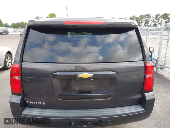 2015 Chevrolet Tahoe LS with VIN 1GNSCAKC0FR245826, listed as a IAAI auction lot 42282590 with 164,208 mi miles and . Bid and sale history available at DreamBid. Image 16.