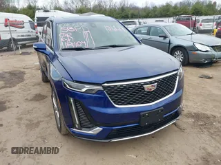 2023 Cadillac XT6 AWD Premium Luxury with VIN 1GYKPDRS2PZ126666, listed as a IAAI auction lot 40963833 with 23,535 mi miles. Bid and sale history available at carsss.com. Image 1.