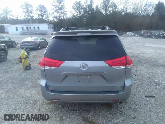 2014 Toyota Sienna XLE with VIN 5TDYK3DC0ES421501, listed as a IAAI auction lot 41672414 with 111,911 mi miles. Bid and sale history available at carsss.com. Image 16.