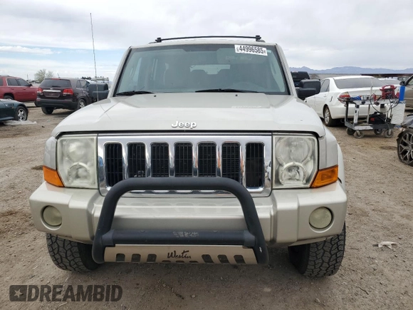 2009 Jeep Commander Sport z VIN 1J8HH48K79C519351, wystawiony jako Copart lot #44996585 z przebiegiem 153 891 mil mil oraz Czysty tytuł • Clean title. Historia ofert i sprzedaży dostępna na DreamBid. Obrazek 5.