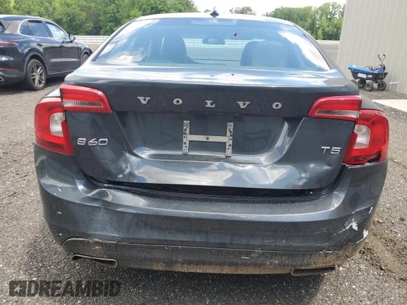 2014 Volvo S60 T5 z VIN YV1612FS6E1287285, wystawiony jako Copart lot #56614785 z przebiegiem 104 637 mil mil oraz Szkody całkowita. Historia ofert i sprzedaży dostępna na DreamBid. Obrazek 6.