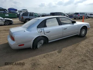 1996 Infiniti Q45 z VIN JNKNG01D1TM404004, wystawiony jako Copart lot #54433905 z przebiegiem 157 775 mil mil oraz Nie do naprawy. Historia ofert i sprzedaży dostępna na DreamBid. Obrazek 3.