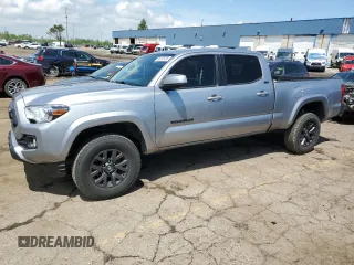2021 Toyota Tacoma SR5 z VIN 3TMDZ5BN9MM100940, wystawiony jako Copart lot #56705185 z przebiegiem 88 523 mil mil oraz Czysty tytuł • Clean title. Historia ofert i sprzedaży dostępna na DreamBid. Obrazek 1.