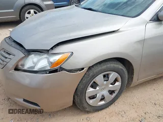 2007 Toyota Camry CE with VIN 4T1BE46K97U569695, listed as a IAAI auction lot 39701395 with 282,284 mi miles and . Bid and sale history available at DreamBid. Image 14.