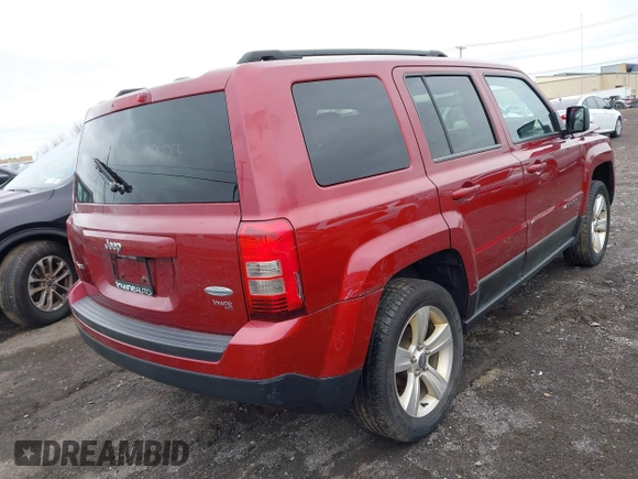 2014 Jeep Patriot Latitude with VIN 1C4NJRFB6ED892819, listed as a IAAI auction lot 42053389 with 92,213 mi miles and . Bid and sale history available at carsss.com. Image 4.