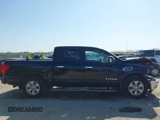 2017 Nissan Titan SV with VIN 1N6AA1E68HN535917, listed as a IAAI auction lot 41974261 with 162,561 mi miles and . Bid and sale history available at DreamBid. Image 14.