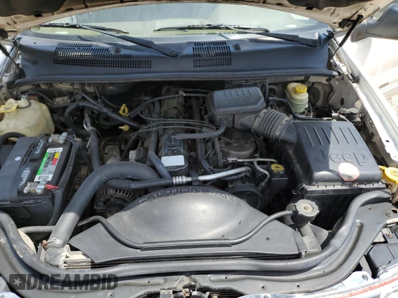 2002 Jeep Grand Cherokee Laredo z VIN 1J4GX48SX2C292081, wystawiony jako Copart lot #54246255 z przebiegiem 167 082 mil mil oraz Szkoda całkowita • Salvage title. Historia ofert i sprzedaży dostępna na DreamBid. Obrazek 12.