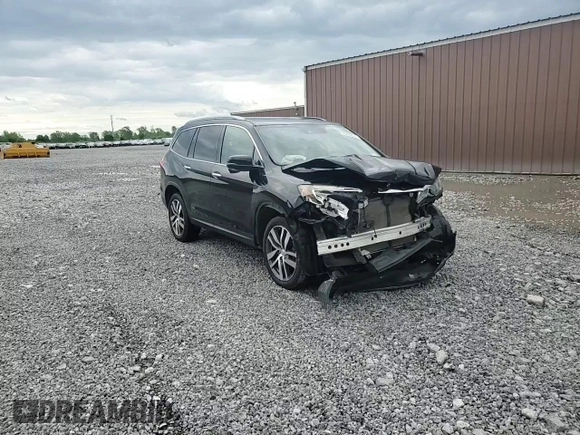 2017 Honda Pilot Touring z VIN 5FNYF6H91HB011030, wystawiony jako Copart lot #60236875 z przebiegiem 119 909 mil mil oraz Szkoda całkowita • Salvage title. Historia ofert i sprzedaży dostępna na DreamBid. Obrazek 14.