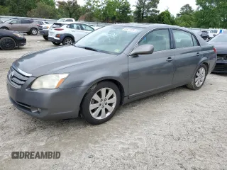 2005 Toyota Avalon XL z VIN 4T1BK36B75U016558, wystawiony jako Copart lot #58411925 z przebiegiem 295 850 mil mil oraz Szkoda całkowita • Salvage title. Historia ofert i sprzedaży dostępna na DreamBid. Obrazek 1.