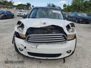 2013 MINI Countryman with VIN WMWZB3C5XDWM31715, listed as a Copart auction lot 57028565 with 95,453 mi miles and Salvage title. Bid and sale history available at DreamBid. Image 5.