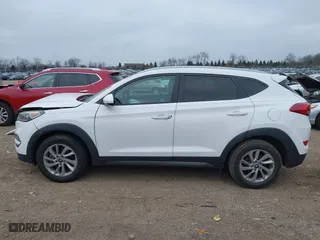 2016 Hyundai Tucson SE with VIN KM8J3CA46GU105087, listed as a IAAI auction lot 40978420 with 103,527 mi miles. Bid and sale history available at carsss.com. Image 14.