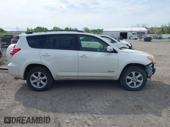 2012 Toyota RAV4 Limited z VIN JTMDF4DV5C5058092, wystawiony jako IAAI lot #42322172 z przebiegiem 216 601 mil mil oraz . Historia ofert i sprzedaży dostępna na DreamBid. Obrazek 14.