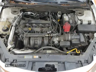 2012 Ford Fusion SE z VIN 3FAHP0HAXCR132060, wystawiony jako Copart lot #56148395 z przebiegiem 172 160 mil mil oraz Czysty tytuł • Clean title. Historia ofert i sprzedaży dostępna na DreamBid. Obrazek 11.