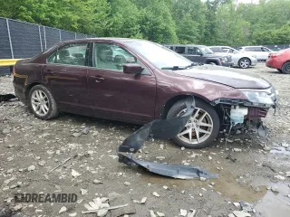 2012 Ford Fusion SEL with VIN 3FAHP0JA9CR308736, listed as a Copart auction lot 58569775 with 184,857 mi miles and Non repairable. Bid and sale history available at DreamBid. Image 4.