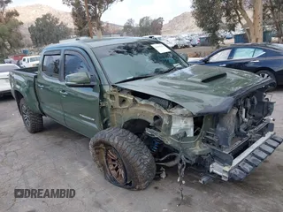 2021 Toyota Tacoma 4WD SR5 with VIN 3TMDZ5BN0MM116198, listed as a IAAI auction lot 41445815 with 59,561 mi miles. Bid and sale history available at carsss.com. Image 1.