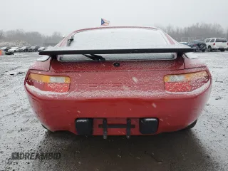 1987 Porsche 928 z VIN WP0JB0926HS860519, wystawiony jako Copart lot #84757504 z przebiegiem 64 737 mil mil oraz Szkody całkowita. Historia ofert i sprzedaży dostępna na DreamBid. Obrazek 6.