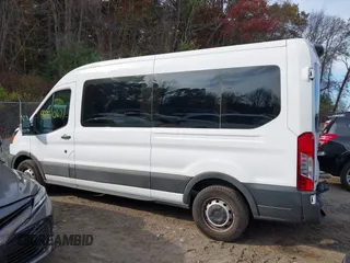 2023 Ford Transit Cargo with VIN 1FTBR1C86PKA52494, listed as a IAAI auction lot 40740671 with 9,999 mi miles and . Bid and sale history available at DreamBid. Image 14.