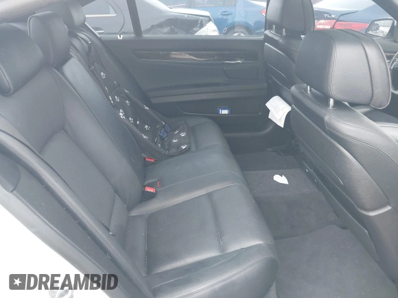 2015 BMW 7 Series 740Li with VIN WBAYE4C54FD947205, listed as a IAAI auction lot 41566291 with 172,729 mi miles and . Bid and sale history available at DreamBid. Image 8.