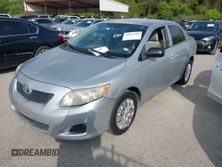 2009 Toyota Corolla with VIN 1NXBU40E19Z027967, listed as a IAAI auction lot 41922518 with 117,115 mi miles. Bid and sale history available at carsss.com. Image 2.