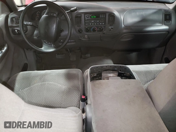 1999 Ford F-150 с VIN 1FTRX18WXXNB68274, выставлен на аукционе Copart как лот 42176915 с пробегом Не указан миль и Списание • Salvage title. История ставок и продаж доступна на DreamBid. Изображение 8.