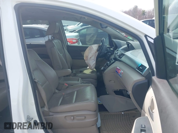 2012 Honda Odyssey EX-L with VIN 5FNRL5H65CB082916, listed as a IAAI auction lot 42052713 with 217,267 mi miles and . Bid and sale history available at carsss.com. Image 5.