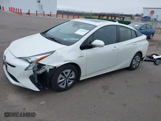 2016 Toyota Prius Four with VIN JTDKARFUXG3026652, listed as a IAAI auction lot 41936423 with 74,063 mi miles. Bid and sale history available at carsss.com. Image 2.