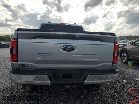2023 Ford F-150 XL with VIN 1FTEW1C50PKF91124, listed as a Copart auction lot 51538865 with 22,128 mi miles and Salvage title. Bid and sale history available at DreamBid. Image 6.