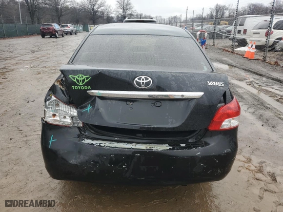 2012 Toyota Yaris with VIN JTDBT4K31C1418998, listed as a Copart auction lot 43506805 with 138,976 mi miles and Salvage Title. Bid and sale history available at carsss.com. Image 6.