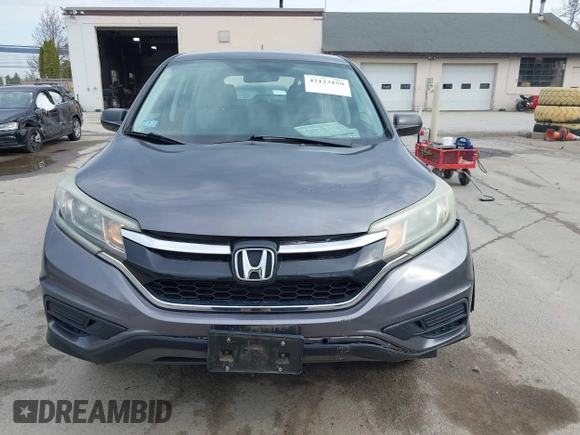 2015 Honda CR-V LX with VIN 5J6RM4H34FL031089, listed as a IAAI auction lot 42123159 with 74,566 mi miles and . Bid and sale history available at DreamBid. Image 12.