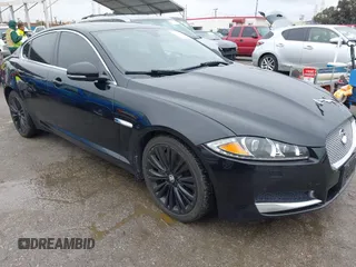 2012 Jaguar XF Portfolio with VIN SAJWA0HB7CLS37876, listed as a IAAI auction lot 41815225 with 73,016 mi miles. Bid and sale history available at carsss.com. Image 1.