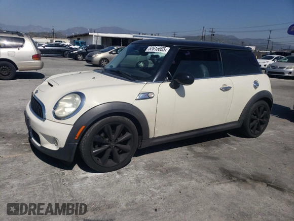 2009 MINI Hardtop S with VIN WMWMF73569TW80561, listed as a Copart auction lot 52615805 with 109,968 mi miles and Salvage title. Bid and sale history available at DreamBid. Image 1.