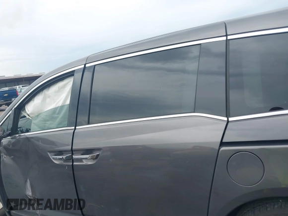 2016 Honda Odyssey Touring Elite with VIN 5FNRL5H97GB010048, listed as a IAAI auction lot 40212711 with 119,009 mi miles and . Bid and sale history available at DreamBid. Image 14.