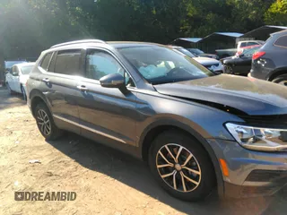 2021 Volkswagen Tiguan SE z VIN 3VV3B7AX8MM050709, wystawiony jako IAAI lot #34335076 z przebiegiem 12 954 mil mil oraz . Historia ofert i sprzedaży dostępna na DreamBid. Obrazek 1.