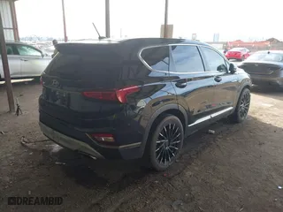 2019 Hyundai Santa Fe SE with VIN 5NMS23AD1KH112931, listed as a IAAI auction lot 41678592 with 96,477 mi miles. Bid and sale history available at carsss.com. Image 4.