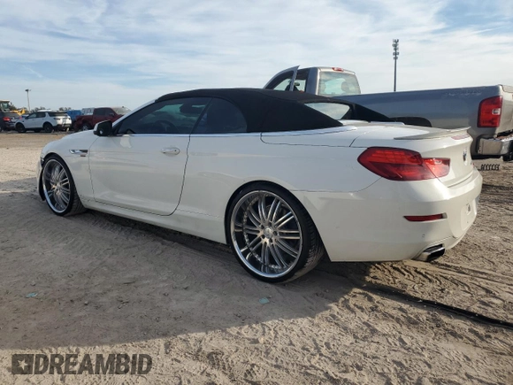 2012 BMW 6 Series 650i z VIN WBALZ3C56CDL72058, wystawiony jako Copart lot #43246815 z przebiegiem 133 048 mil mil oraz Tytuł czysty. Historia ofert i sprzedaży dostępna na DreamBid. Obrazek 2.