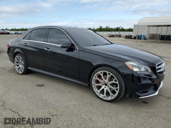 2015 Mercedes-Benz E 350 Sport with VIN WDDHF5KB5FB083344, listed as a Copart auction lot 51479885 with 159,283 mi miles and Salvage title. Bid and sale history available at DreamBid. Image 4.