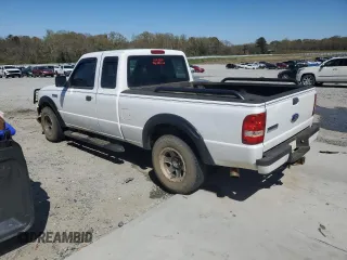 2010 Ford Ranger XL with VIN 1FTKR1ED1APA75380, listed as a Copart auction lot 50027085 with 223,895 mi miles and Salvage title. Bid and sale history available at DreamBid. Image 2.