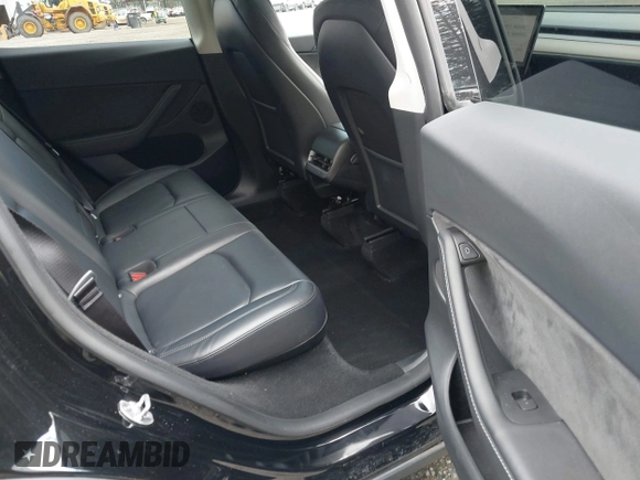 2024 Tesla Model Y with VIN 7SAYGDED3RF119101, listed as a IAAI auction lot 42019817 with 35,714 mi miles and . Bid and sale history available at DreamBid. Image 8.