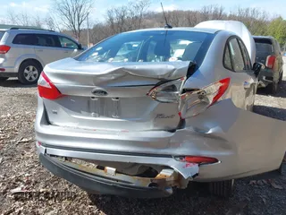 2016 Ford Fiesta SE with VIN 3FADP4BJ4GM106538, listed as a IAAI auction lot 41871345 with 123,847 mi miles. Bid and sale history available at carsss.com. Image 6.
