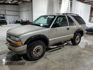 2000 Chevrolet Blazer LS z VIN 1GNCT18W9YK188091, wystawiony jako Copart lot #78592844 z przebiegiem 69 497 mil mil oraz Szkoda całkowita • Salvage title. Historia ofert i sprzedaży dostępna na DreamBid. Obrazek 1.