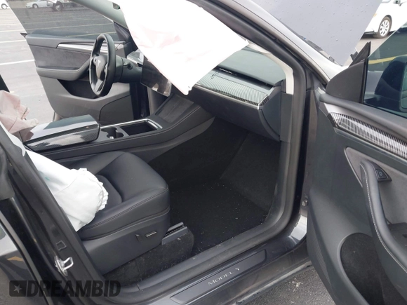 2024 Tesla Model Y z VIN 7SAYGDED3RF041788, wystawiony jako IAAI lot #42644453 z przebiegiem 22 189 mil mil oraz . Historia ofert i sprzedaży dostępna na DreamBid. Obrazek 5.