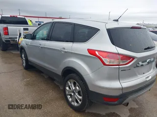 2013 Ford Escape SEL with VIN 1FMCU0H99DUC72013, listed as a IAAI auction lot 41952599 with 177,081 mi miles. Bid and sale history available at carsss.com. Image 3.