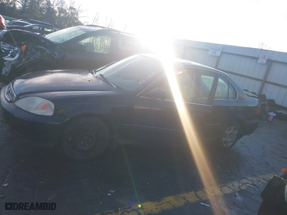 1999 Honda Civic EX with VIN 1HGEJ8644XL037266, listed as a IAAI auction lot 41254910 with 171,509 mi miles. Bid and sale history available at carsss.com. Image 14.
