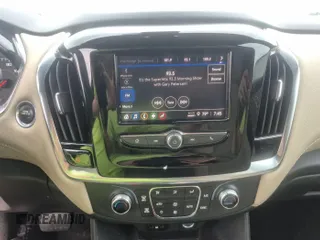 2022 Chevrolet Traverse LS with VIN 1GNEVLKW4NJ100587, listed as a IAAI auction lot 42623761 with 71,190 mi miles and . Bid and sale history available at DreamBid. Image 3.