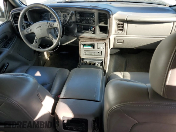 2005 GMC Sierra Denali z VIN 2GTEK63N551145668, wystawiony jako Copart lot #50544675 z przebiegiem Nie podano mil oraz Tytuł czysty. Historia ofert i sprzedaży dostępna na DreamBid. Obrazek 8.