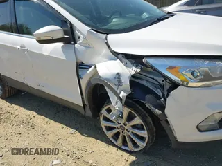 2017 Ford Escape Titanium with VIN 1FMCU9J96HUE21191, listed as a IAAI auction lot 42006013 with 71,786 mi miles. Bid and sale history available at carsss.com. Image 6.